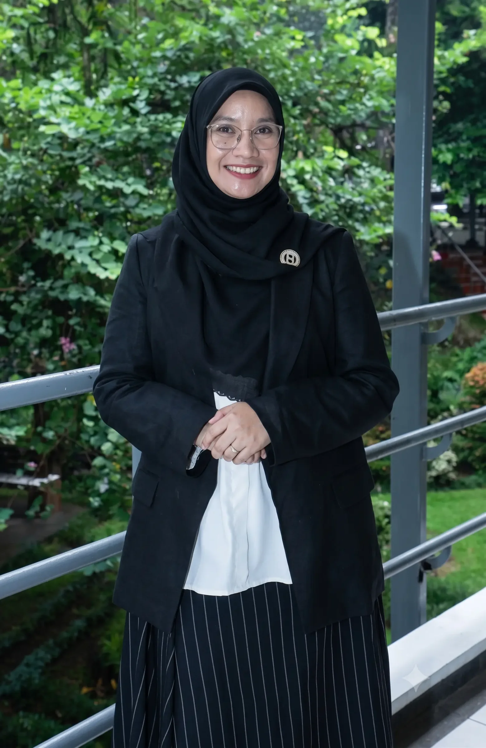 Dr. Amalia, S.P., M.M.